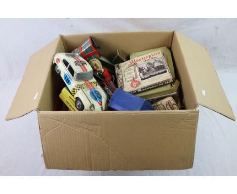 Collection of vintage toys and games to include tinplate Hornby Speedboat Hawk, tinplate KO Japan robot, various games, boxed