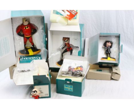 Five boxed Walt Disney Classics Collection ceramic figures all featuring The Incredibles to include Mr Incredible, Edna Molde