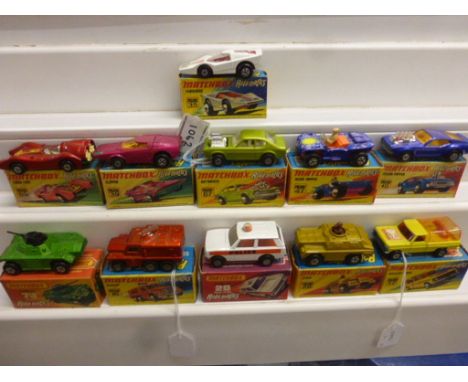 11 Boxed Matchbox Rolamatics 75 Series diecast models to include 73 Weasel, 20 Police Patrol, 39 Clipper in metallic cerise, 