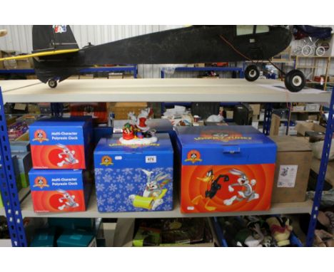 Seven boxed Warner Brothers Looney Tunes ceramic collectables featuring Wedgwood, Jim Shore figure etc plus one empty box