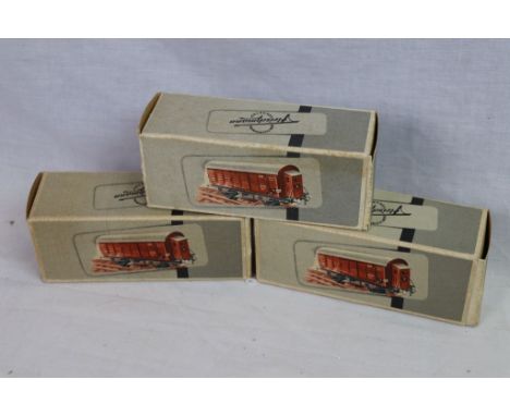 Three boxed Fleischmann O gauge 450 wagons in vg condition 