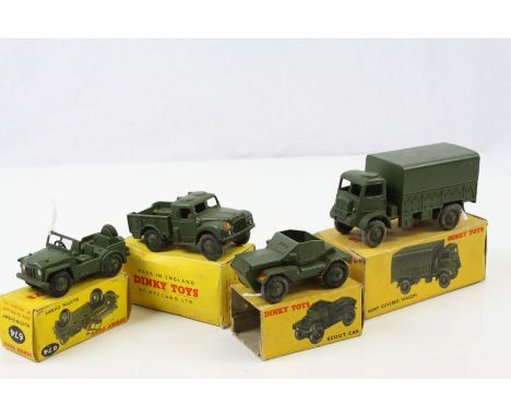 Four boxed Dinky military vehicles to include 623 Army Covered Wagon, 673 Scout Car, 674 Austin Champ and 641 Army I Ton Carg