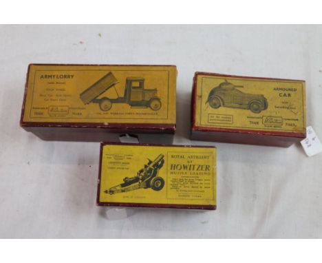 Three boxed Britains military models to include 1334 Army Lorry with lorry (repair to base), 1725 4.5" Howitzer Muzzle Loadin