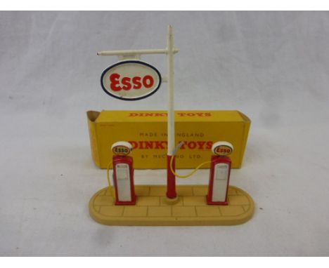 Boxed Dinky 781 Petrol Pumps Station ESSO complete and in gd condition with minor paint loss, box gd with one side end flap s