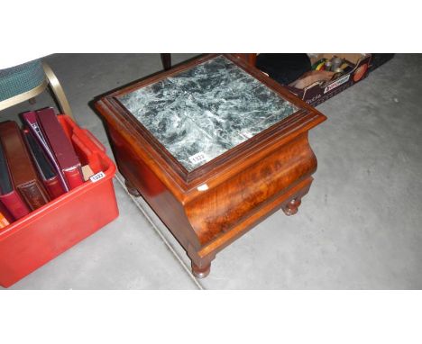 A mahogany commode converted into storage box