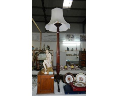 A Victorian mahogany torchere converted to a standard lamp