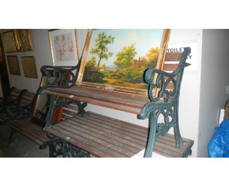 An iron framed garden bench