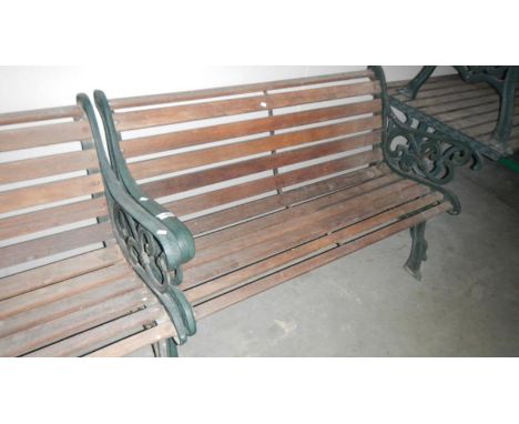 An iron framed garden bench