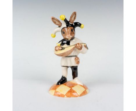 Unusual colorway variation; black and white costume with yellow pompons. Bunnykins figure playing the mandolin. Royal Doulton