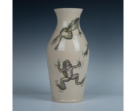 An excellent cream-colored vase with a carved army of grotesque frogs, some clutching beetles with their clawed webbed foot. 