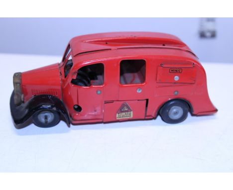 A vintage Tri-ang Minictoys tin plate fire engine 