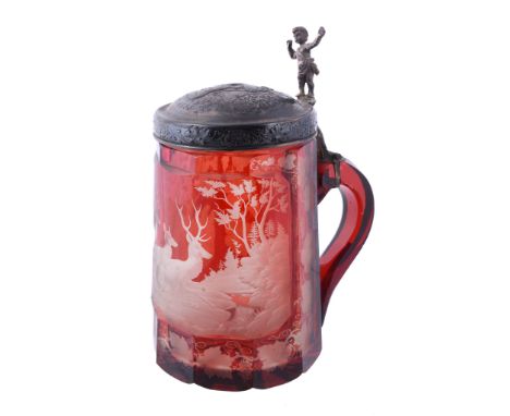 A Bohemian ruby-flashed white-metal-mounted hunting tankard   A Bohemian ruby-flashed white-metal-mounted hunting tankard,   