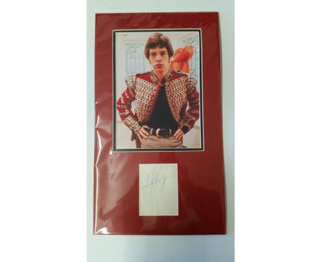 POP MUSIC, The Rolling Stones, signed page by Mick Jagger, overmounted beneath colour photo half length, 12 x 21 overall, EX