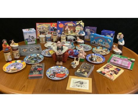 Wallace and Gromit memorabilia - Churchill china plates, tea pot, modelling kits, jigsaw puzzle, tea caddy, cheese cracker ti