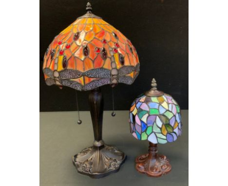 A Tiffany style side light, the dome shaped with dragonflies, 55cm high;  another, smaller (2) 