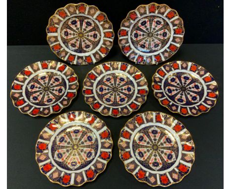 A set of five Royal Crown Derby 1128 pattern wavy edge plates,  printed mark (first);  two similar (seconds) 