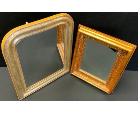 A contemporary arched silvered framed wall mirror, 61cm x 49cm overall;  another smaller gilt framed (2) 