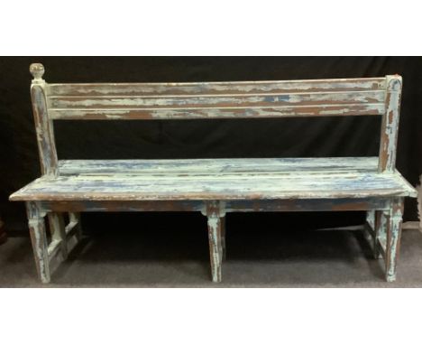 A late 19th century pine station bench, 190cm long, 76cm deep. 