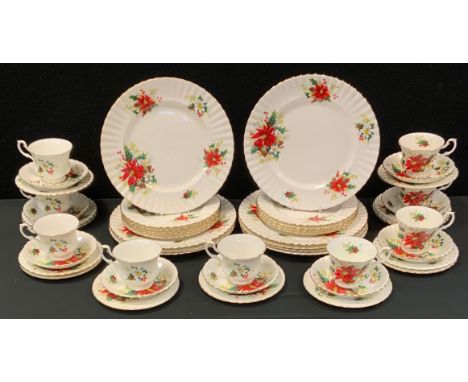 A Royal Albert Poinsette dinner and tea service, for nine 