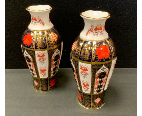 A pair of  Royal Crown Derby 1128 pattern lobed vases, 19cm high, printed mark (first) 