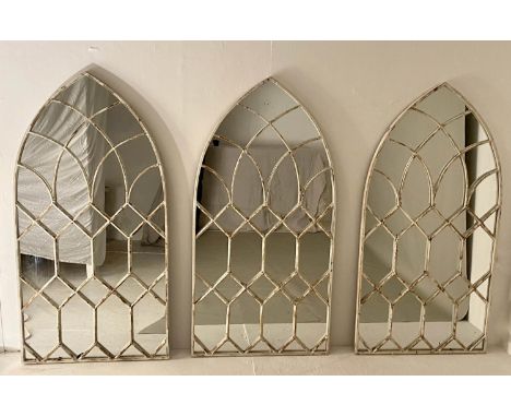 ARCHITECTURAL WALL MIRRORS, a set of three, 132cm x 66cm, aged white painted finish. (3) 