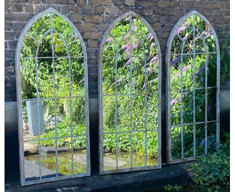 ARCHITECTURAL GARDEN MIRRORS, a set of three, gothic style, 160cm x 67cm. 