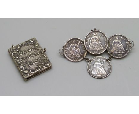 An Art Nouveau 'Memorable Days' white metal book locket charm, a/f, and a silver American Victorian era half dime seated libe
