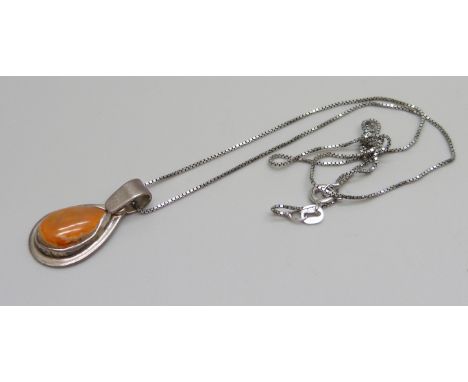 A .950 silver and opal set pendant on a silver chain, 5.6g