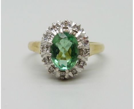 An 18ct gold, diamond and green stone ring, 4.3g, K/L