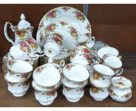 A Royal Albert Old Country Roses tea and coffee set with coffee pot, fourteen tea cups, nineteen saucers, seven coffee cups, 