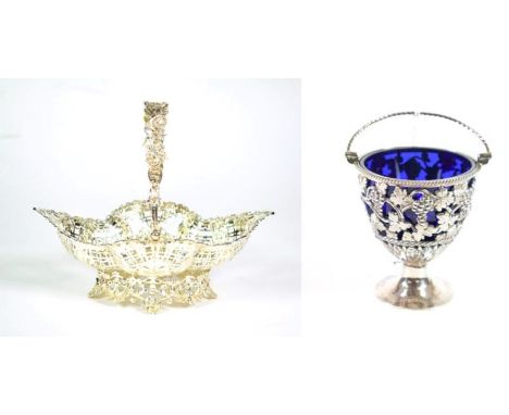 {} A Late Victorian Silver Swing Handled Basket, Goldsmiths &amp; Silversmiths, London 1900, quatrefoil form with C scroll an