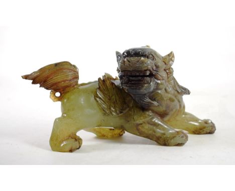 A Chinese Jade Lion Dog, in Ming style, standing roaring, 27cm long