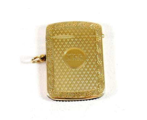 ~ A 9ct Gold Vesta Case, William Neale, Birmingham 1919, with engine turned decoration and engraved border, the front with th