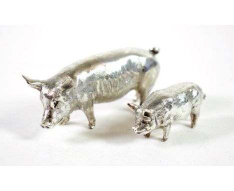 ~ A Cast Silver Model of Boar, Asprey &amp; Co, London 1989; together with Another Smaller Model of a Pig, makers mark indist