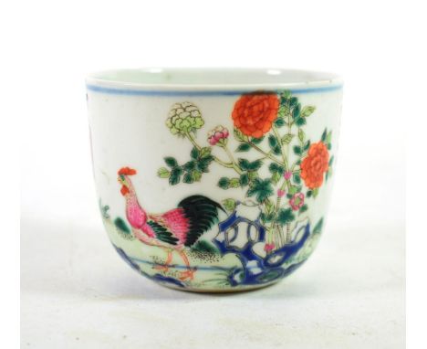 A Chinese Porcelain Chicken Cup, bears Daoguang reign mark, painted in famille rose enamels with a farmer and chickens, the r