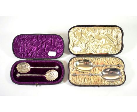 ~ A Pair of Victorian Silver Serving Spoons, Edward Hutton, London 1883, in a fitted case; and A Pair of Victorian Silver Spo