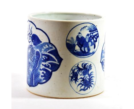 A Chinese Porcelain Brush Pot, in Kangxi style, painted in underglaze blue with panels of mythical beasts, figures and fruit,