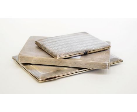 An Engine Turned Silver Cigarette Case, Goldsmiths &amp; Silversmiths, London 1936, rectangular with rounded corners, the cov