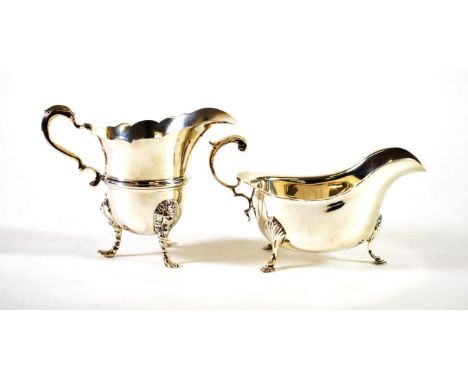 ~ An Edwardian Silver Cream Jug of 18th Century Style, Goldsmiths &amp; Silversmiths, London 1903, with central girdle and on