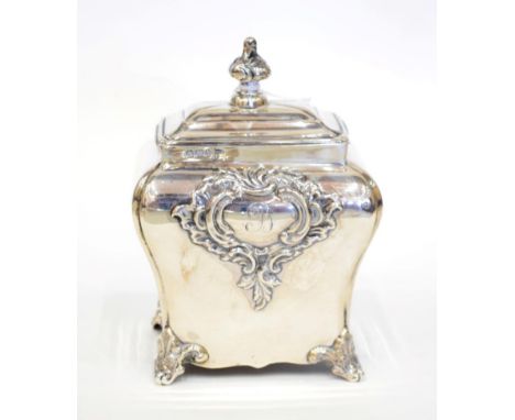 A Late Victorian Silver Tea Caddy, Walker &amp; Hall, Sheffield 1896, rectangular bombe shape on foliate bracket feet in the 