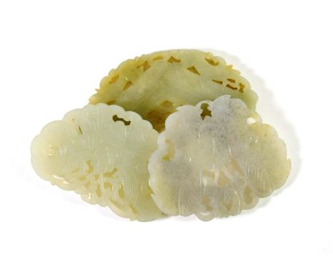 A Chinese Jade Plaque, carved and pierced as a moth, 8cm wide; A Similar Plaque, 8cm wide; and Another, as a precious object,
