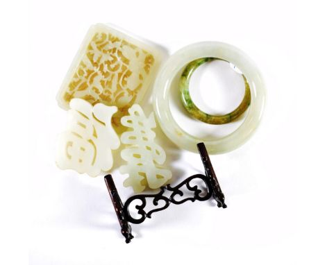 A Chinese Jade Plaque, as a calligraphic character, 5cm long; A Similar Plaque, 5.5cm long; A Rectangular Plaque, carved and 