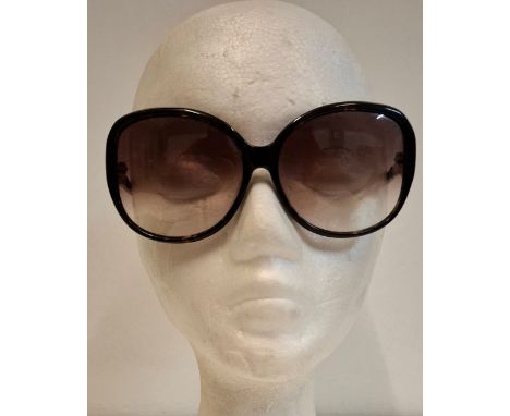 Christian Dior- A pair of vintage tortoiseshell effect sunglasses with later sunglass case. Location:If there is no condition