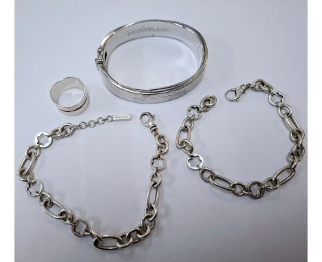 Mont Blanc- A silver hinged bangle with safety chain having the branded name and 925 to the inside, approx 15.5cm internal me