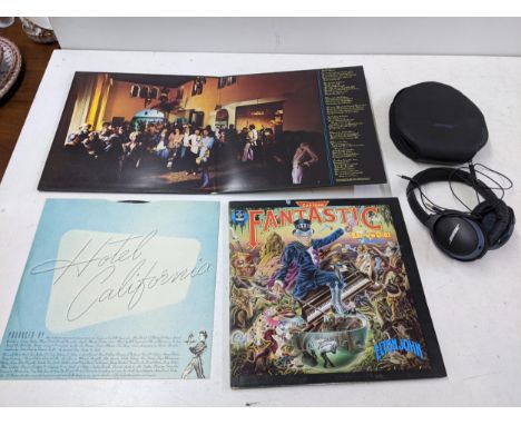 Music related items to include a pair of Bose headphones with Bluetooth, Elton John 'Captain Fantastic' CD and 'Hotel Califor