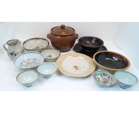 A group of studio pottery, 20th century, to include Tim Andrews bowls and jug with blue flower on buff ground, a Winchcombe P