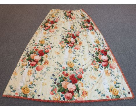 A set of curtains, 20th century, each with floral print on a cream ground with red tassels, comprising: a pair of curtains ea