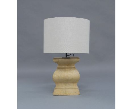 A large contemporary table lamp, circa 2010, carved from a solid block of wood, with cylindrical fabric lined shade, 81cm hig