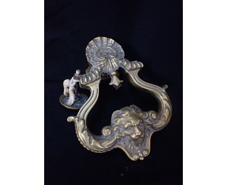 A LARGE ROCOCO STYLE CAST BRASS DOOR KNOCKER WITH NAIL 