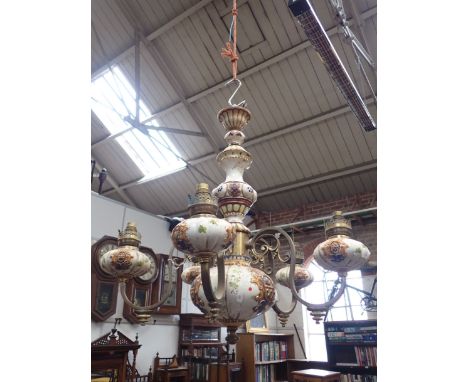 A FIVE BRANCH CERAMIC AND METAL CHANDLIER 65cm high